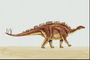 Динозавр с пластинками на спине и шипами на хвосте