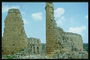 Высеченные вручную каменные блоки сооружённые в башню которая обваливается