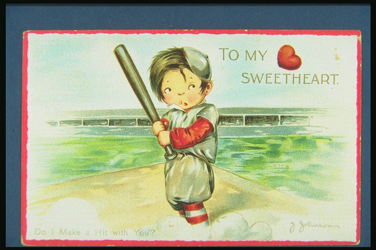 Дечак играјући бејзбол