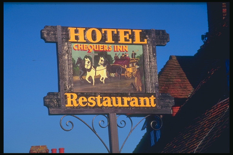 Отель и ресторан. Изображение повозки с белыми лошадями