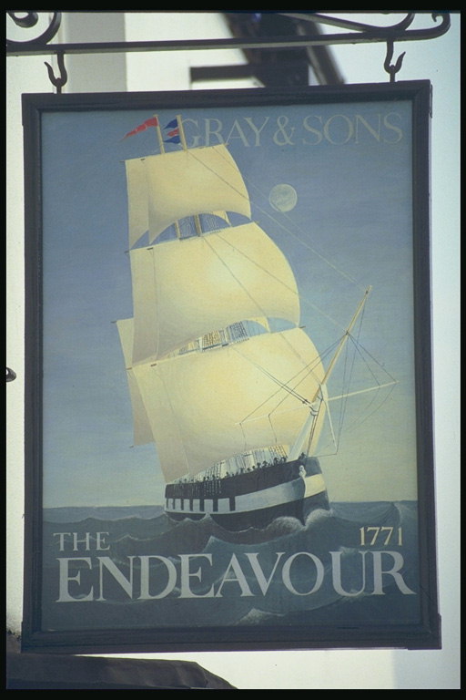 Signboard at the pub with a depiction of a ship on the waves