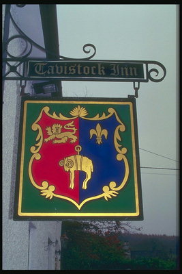 Signboard. Brasón de armas da figura, unha ovellas, un león e do lírio