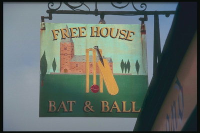 สัญญาณที่มีภาพบ้านและ bats ลูกบอล