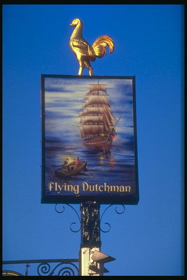 O Flying Dutchman. Signboard amosando o navío. Crepúsculo. A pintura en ton azul