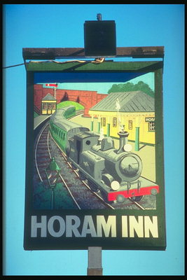 Larger trains and rails for pub sign