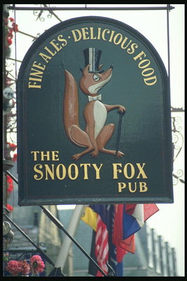 Snooty foxes. The image of the fox hat with a walking stick
