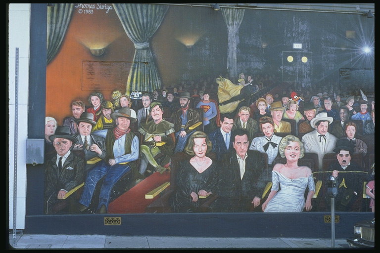 Малюнок зали з людьми в кінотеатрі