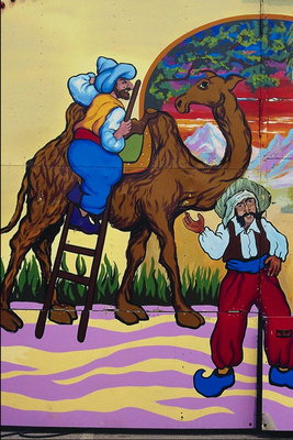 Рисунок азиатских мужчин и верблюда