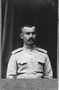 Porträtt av en kosack militär ledare med en mustasch och kort hår