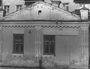 Фотография кирпичного здания выстоявшего бомбардировку в войну