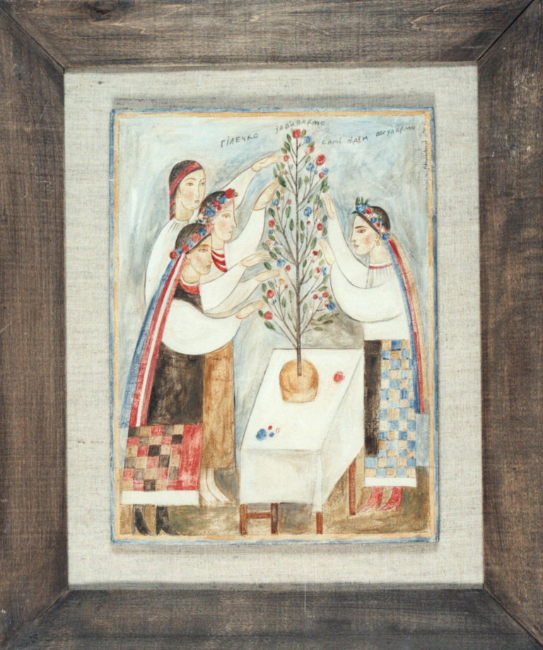 Девушки украшают праздничный хлеб