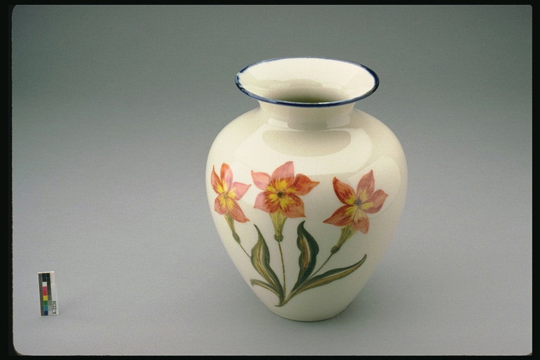 Beige tones with patterned vase of flowers reddish-orange