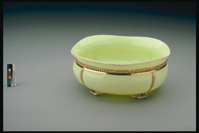Ceramic dishes are yellow with golden rim