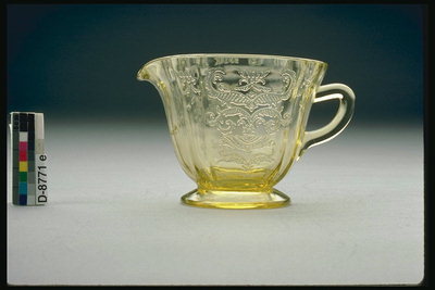 A cup with a spout