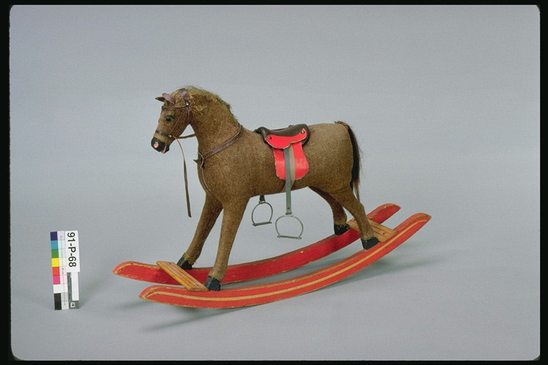 Horse-schommelstoel. Horse Saddle