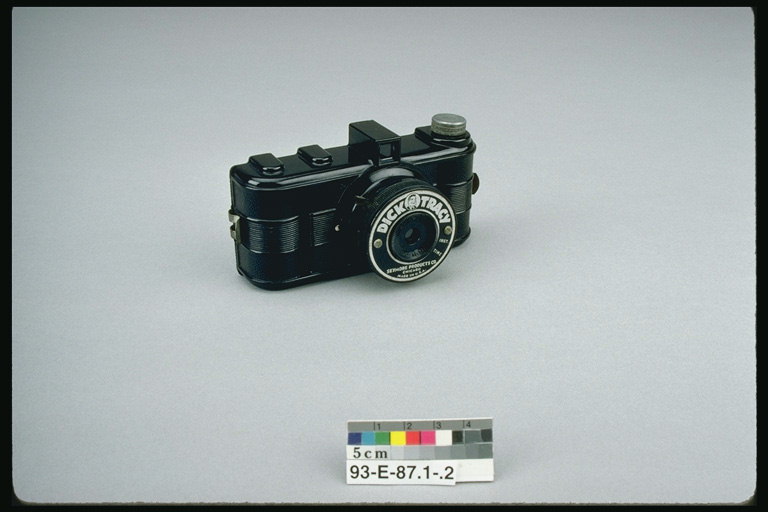 Kameraet med glideskinne linse
