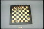 Bestuur en houten schaakbord