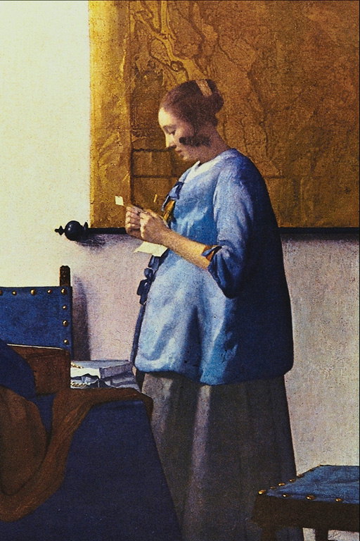 Жінка у письмового столу