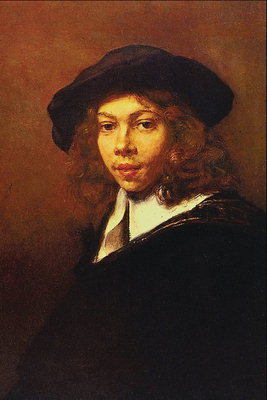Porträtt av en ung kille med långt lockigt hår