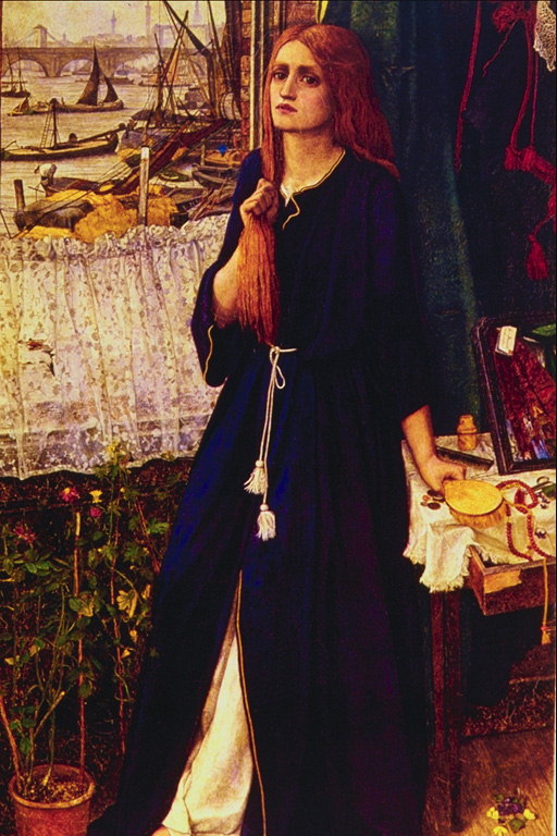 En flicka i en mörkblå mantel