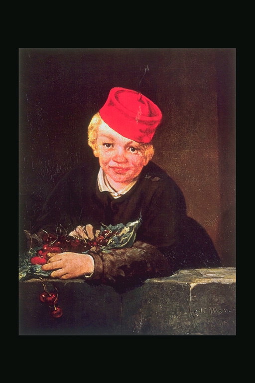 En kille i en röd mössa med en bukett blommor