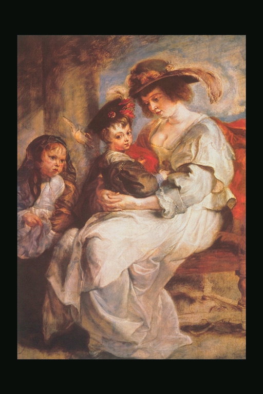 En kvinne med et barn i hennes armer