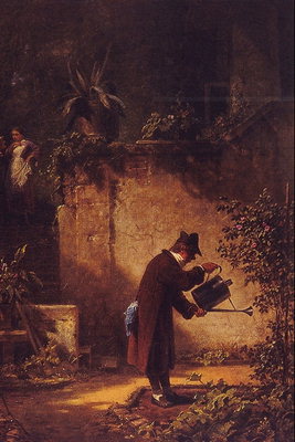 Muž zaléval kvety