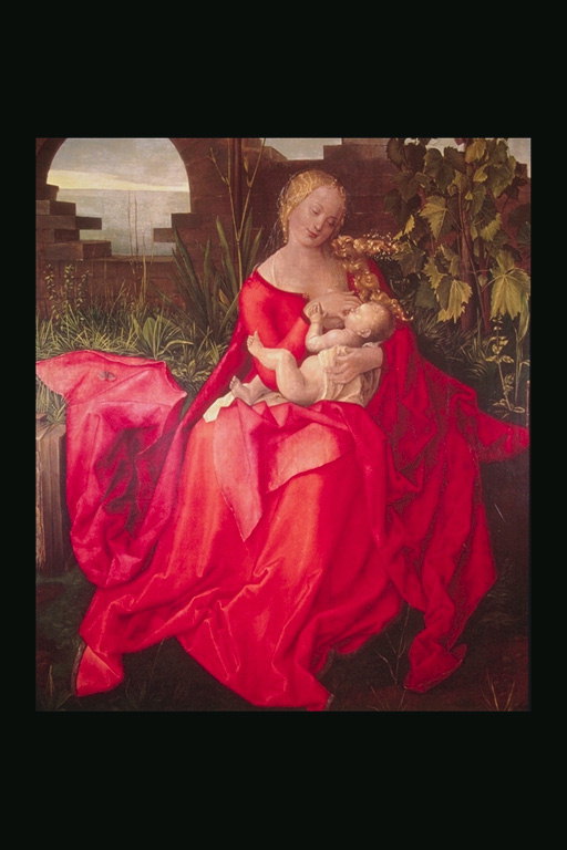 A woman nursing a child
