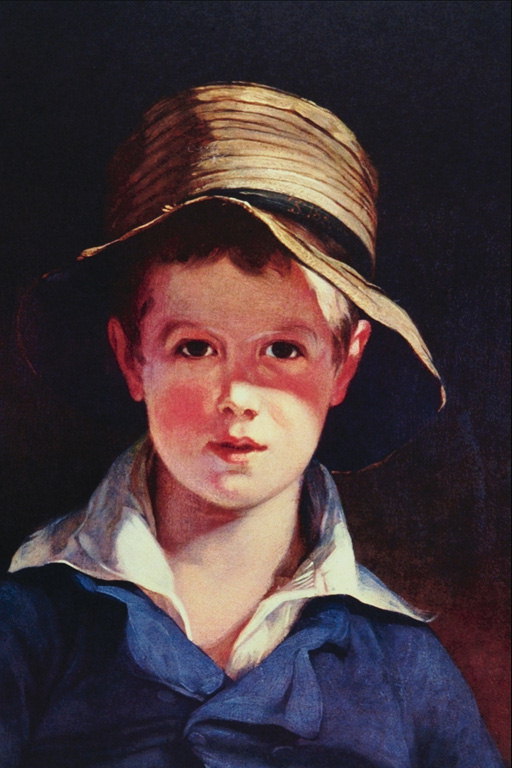 En pojke i en mörkblå jacka av en gammal halm hatt