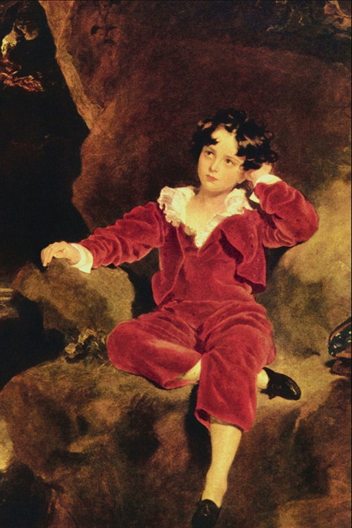 Chlapec v červené sametové šaty na židli