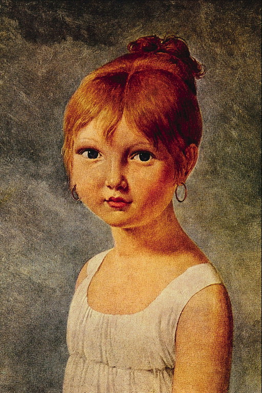 Uma garota com olhos grandes e brincos nas orelhas