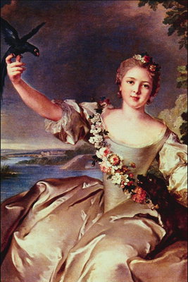 Dívka ve světle hnědé šaty s ozdobným s květinami. Bird na křehké ženské ruce