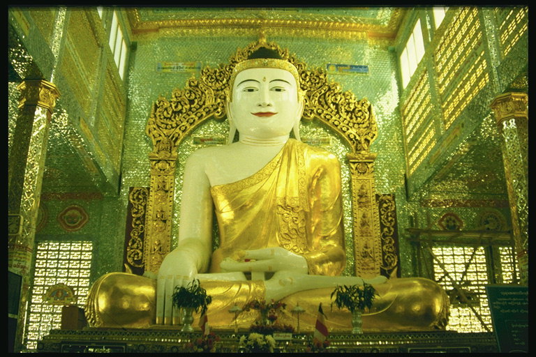 Buddha statue in the walls of the house