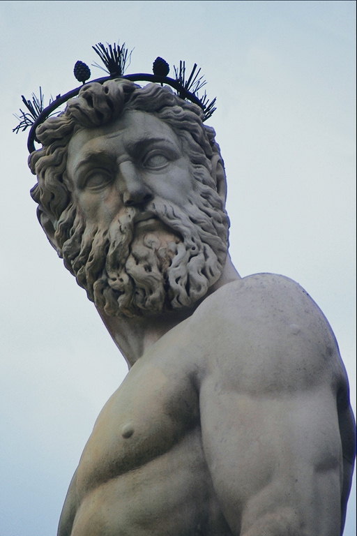Điêu khắc. Một người đàn ông với một tôn lên trên đầu
