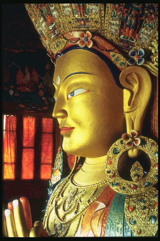 The image of goddess in gold tone