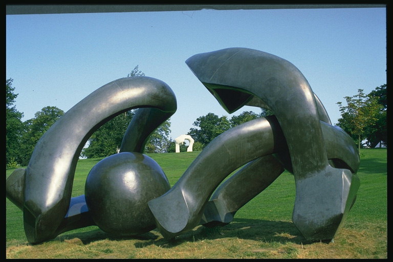 Composition with metal arches and balls