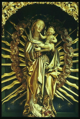 A composição do metal. Virgem Maria com crianças nos braços