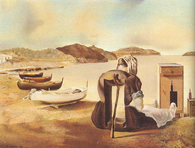 Boats tied at the shore. A man sitting near the bed-side tables