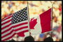 Американский и канадский флаги символизируют дружбу между обеими странами и народами