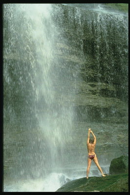 Swimming in a mountain waterfall