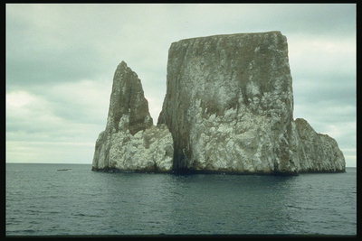 Towering rock in the ocean