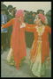 Танец женщин в красных платьях 