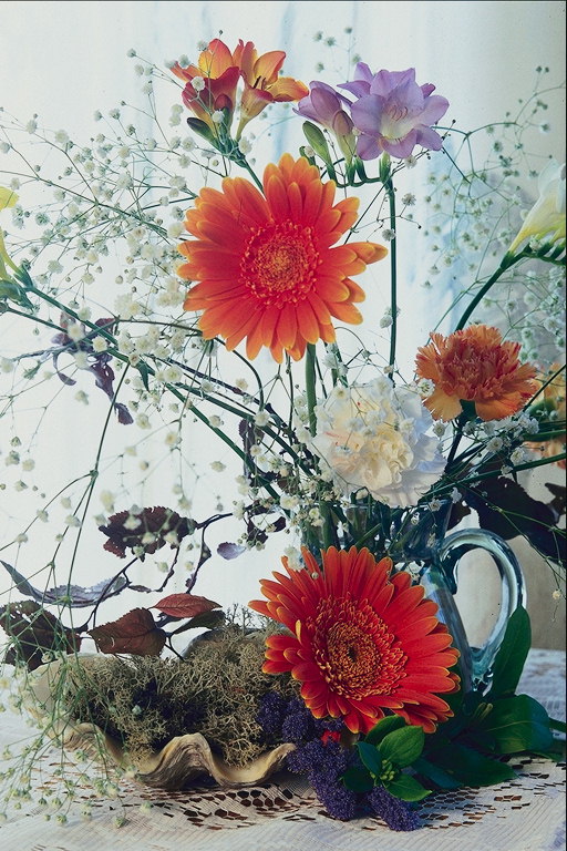 Class flower. A bouquet of gerberas, carnations and bells