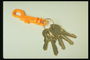 Связка ключей с оранжевым брелком