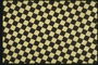 Сочетание бледно-желтых и черных квадратов
