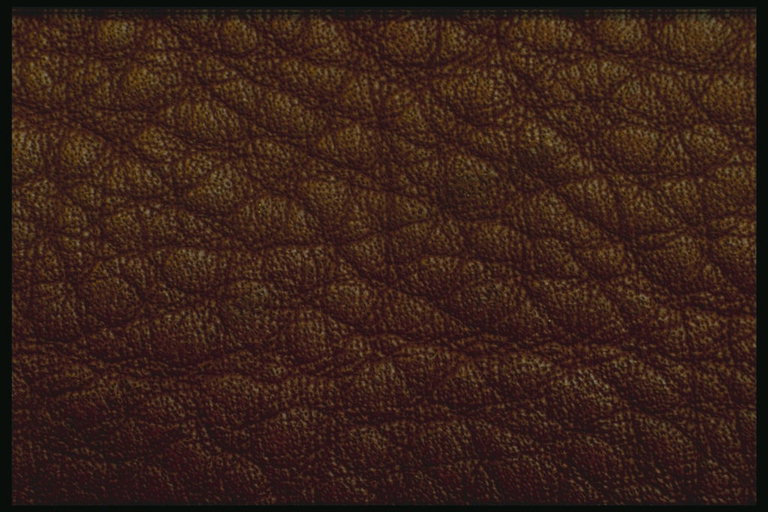 Темно-коричневая ткань с фиолетовым оттенком