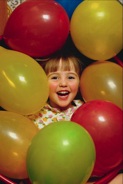The girl and balloons