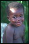 Ένα μαύρο χαμογελαστό παιδί