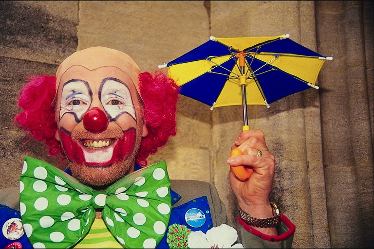 Clown met paraplu