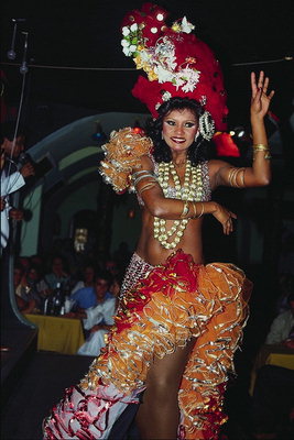 Woman in carnival costumes. Lacy skirt and beads